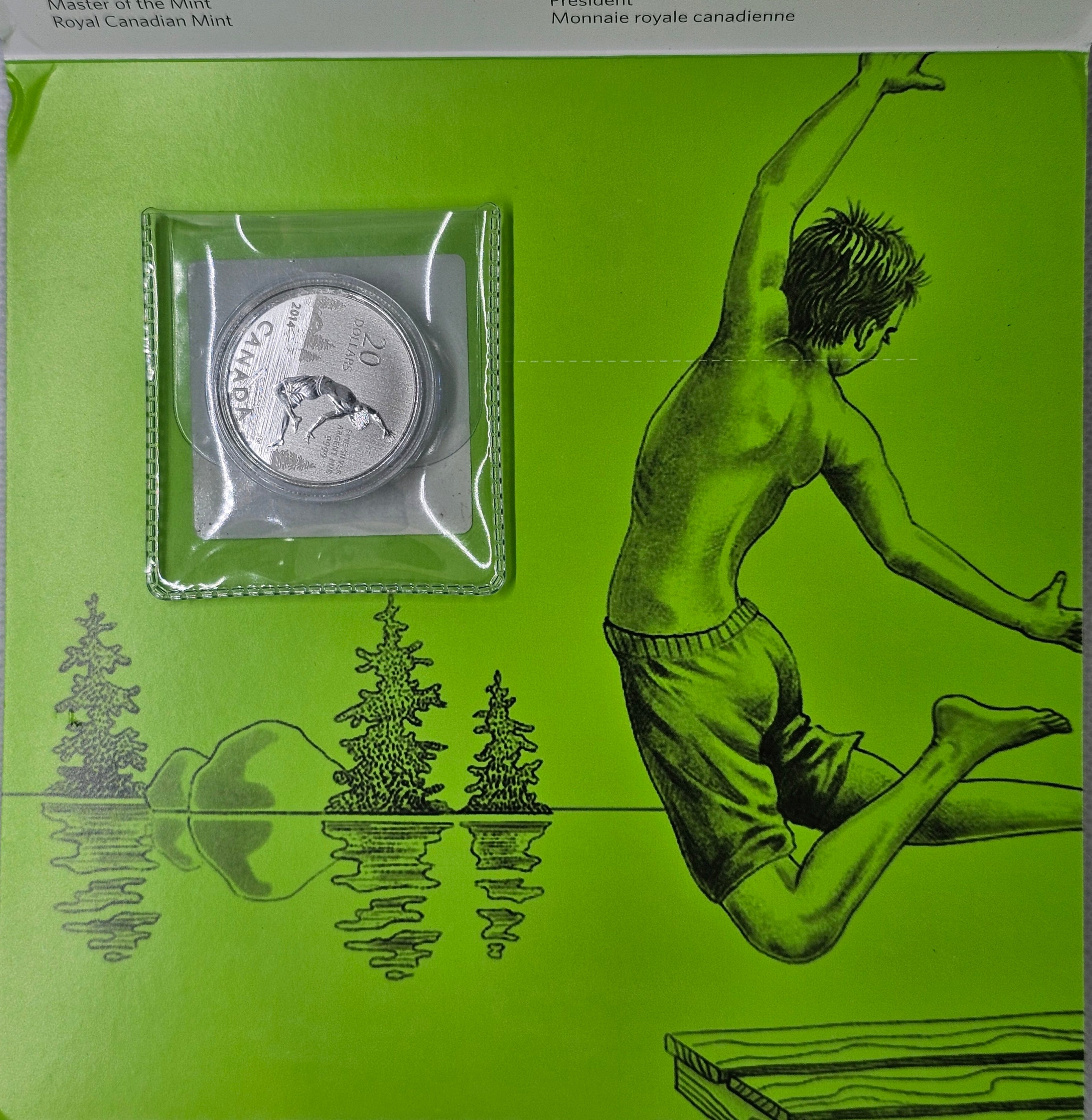 2014 $20 Summer Fun coin sealed in packaging with green lakeside artwork.