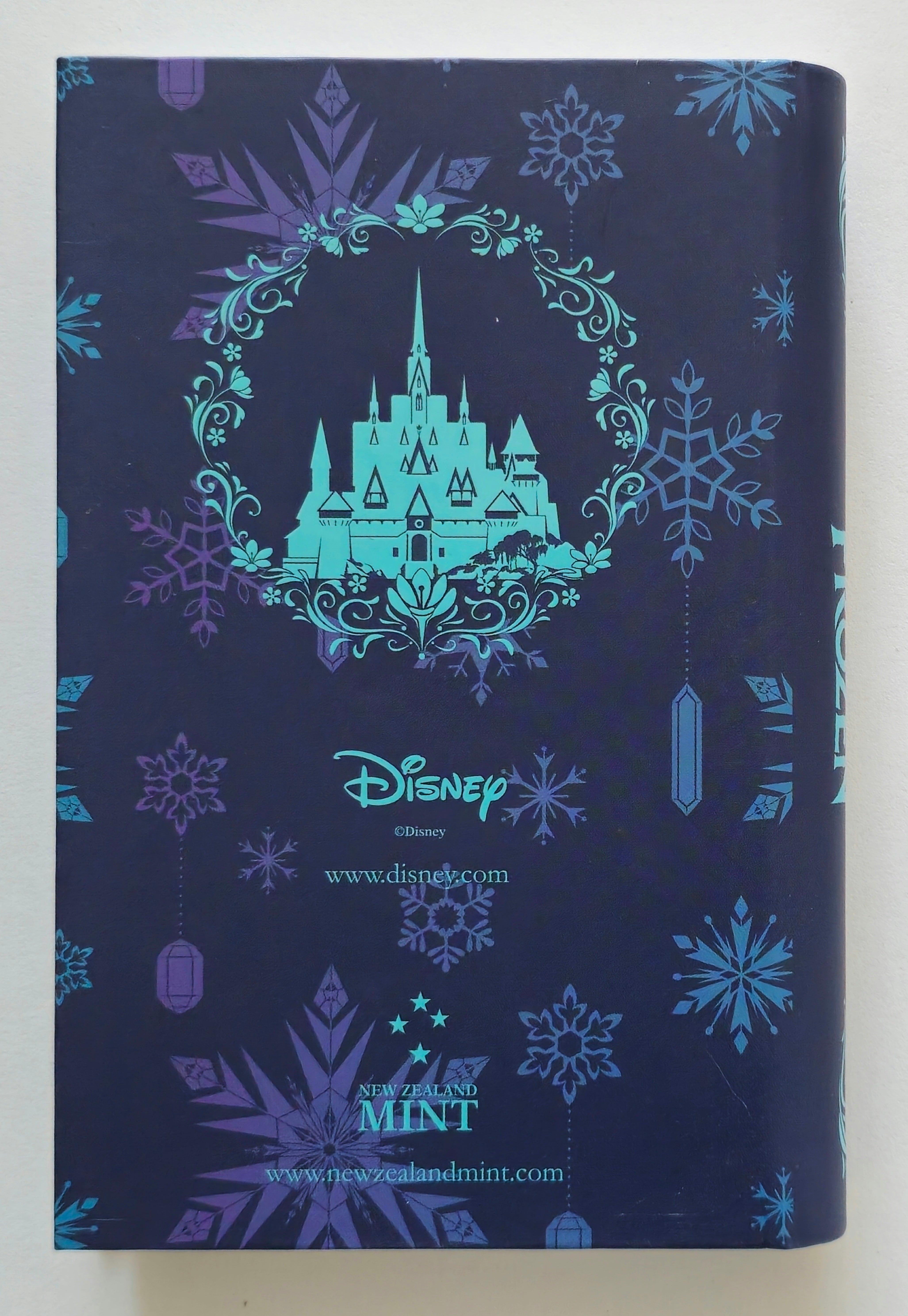 Official New Zealand Mint packaging - the back of a Disney Frozen book