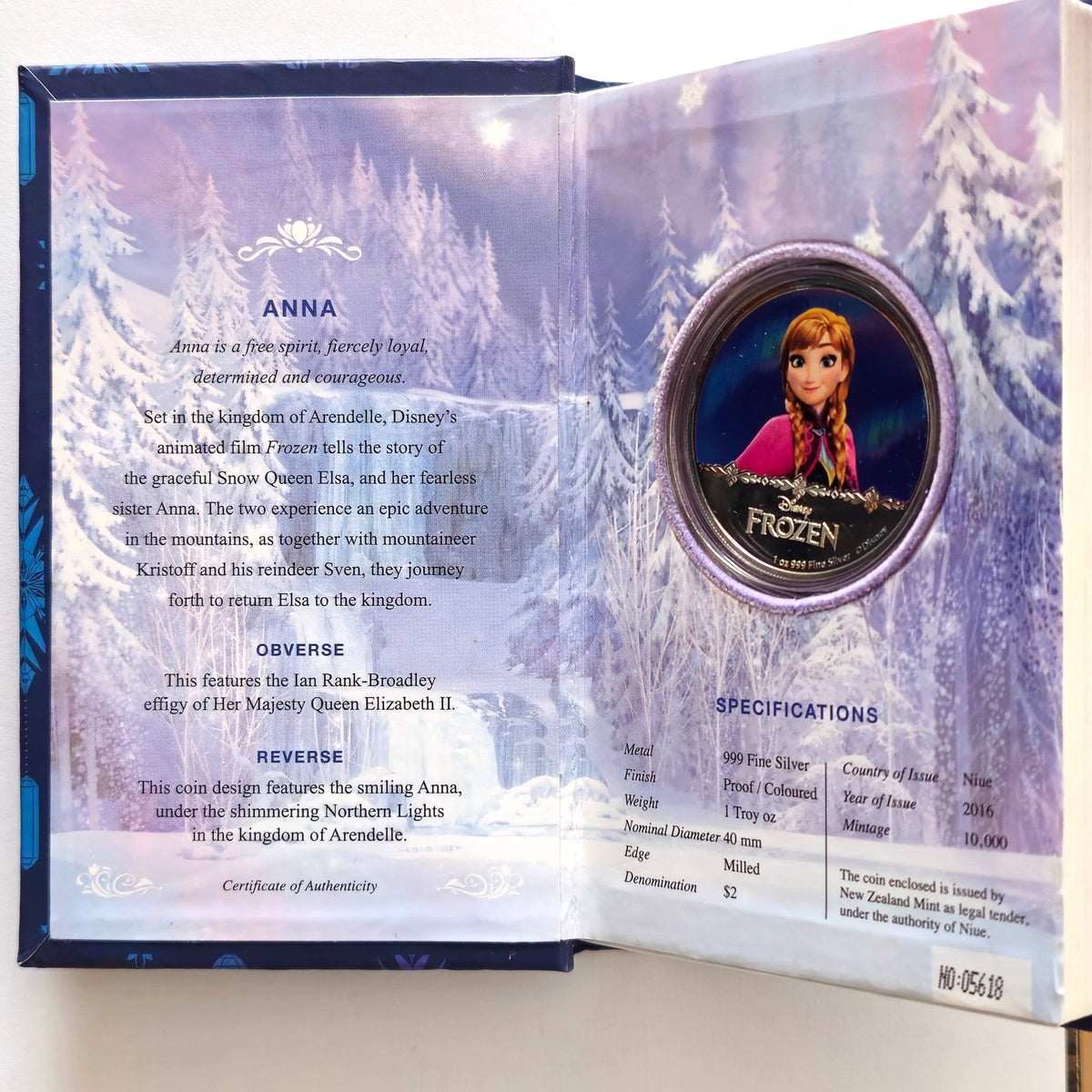 Silver coin Frozen Anna 1 oz by New Zealand Mint — open collectible book with description and official specs.