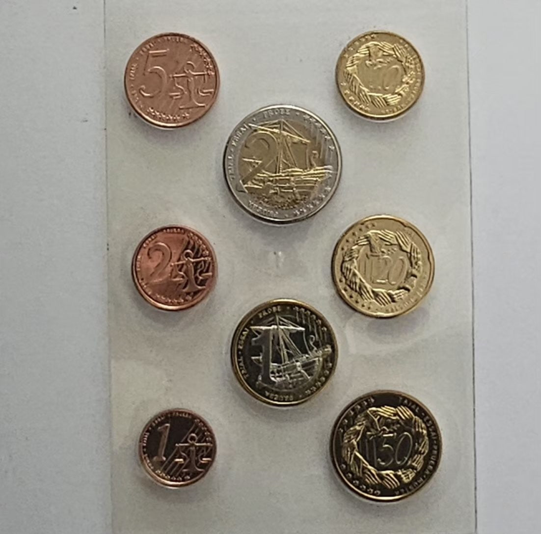 Heligoland pattern coins, value sides: anchor, laurel wreath, Hanseatic cog